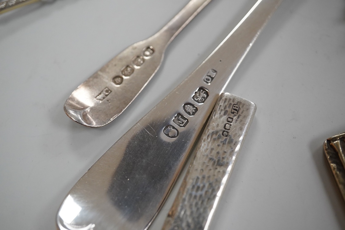 A collection of assorted small silver, including set of six 1930's coffee spoons, a mounted travelling pocket watch case, Victorian pepperette, mounted glass dwarf candlestick, enamelled powder box, Georgian stilton scoo